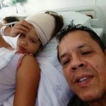Luiza, 11 anos, com  o pai, Paulo Roberto, vigilante da GPS